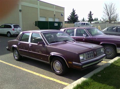 used oldsmobile omega|1984 burgondy oldsmobile omega.